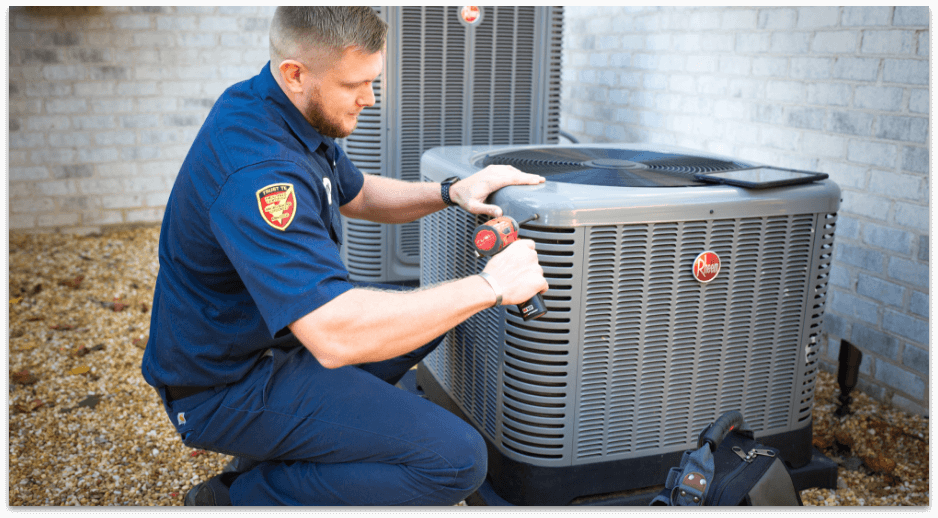 Hvac condensor with hvac technician